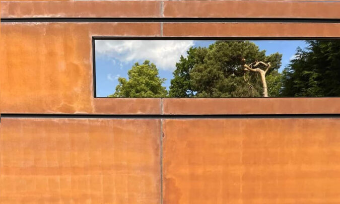 A closer look at weathered corten and black safety glazing