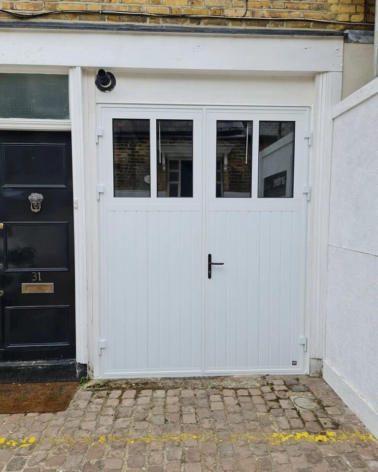 Garage conversion into workshop with customised Traditional design garage door
